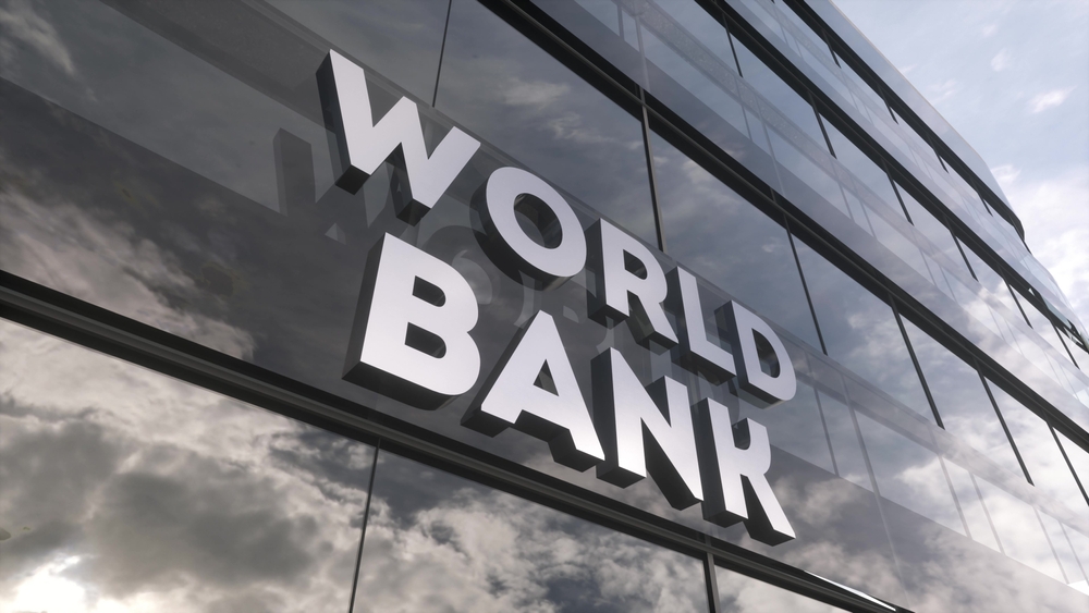 World,Bank,On,Glass,Building.,Mirrored,Sky,And,City,Modern