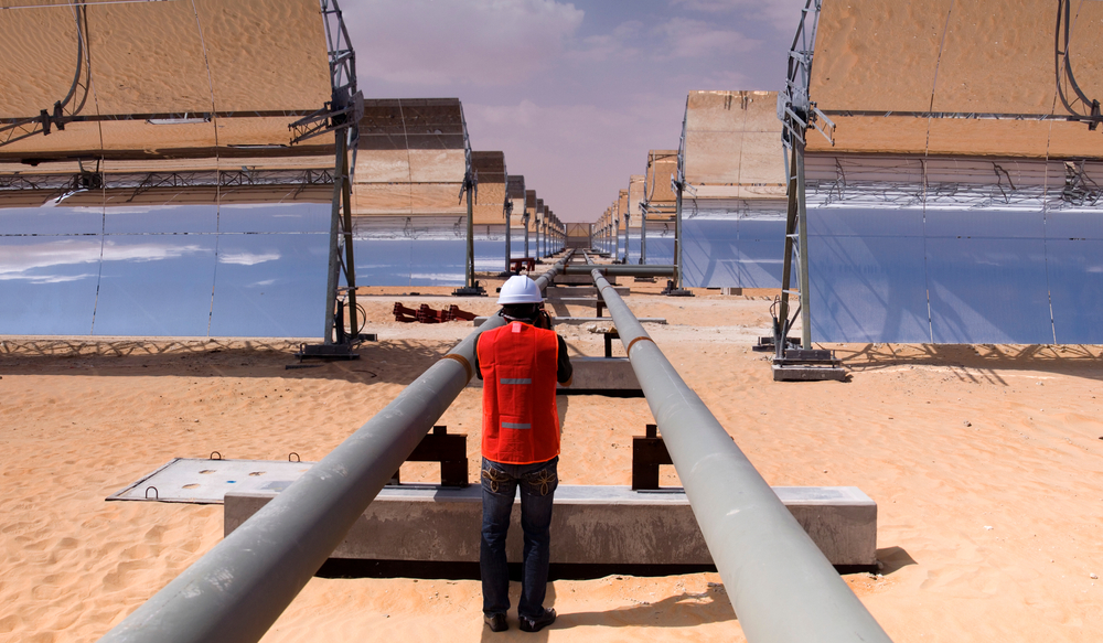 A worker at a concentrated solar power plant