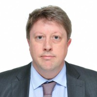 Professional portrait of Paul Shultz,