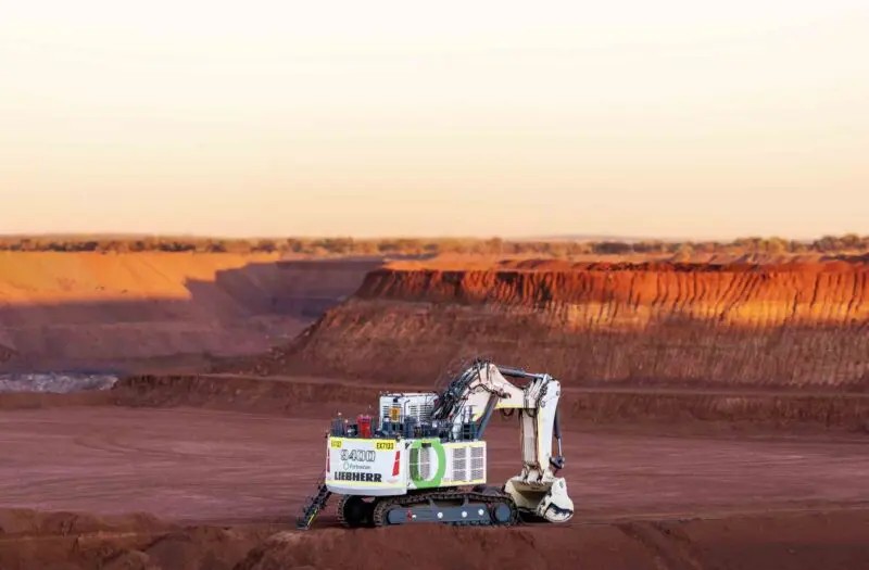 An electric excavator at a desert mine site